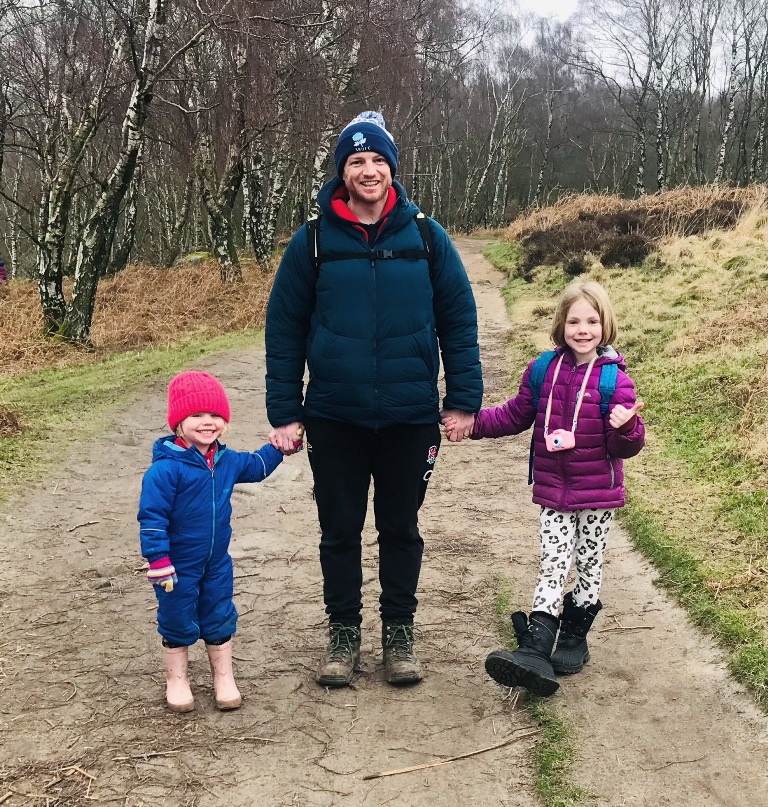 Guy Titman of Baslow Physiotherapy walking with the family in the Peak District