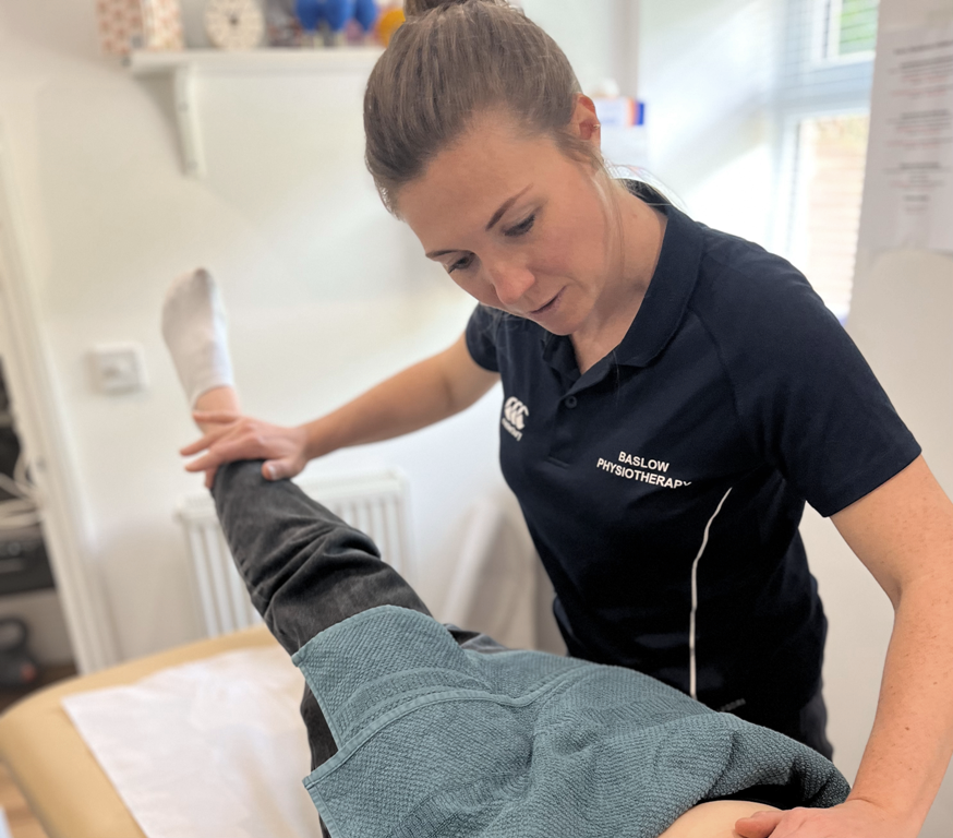 Sarah Titman of Baslow Physiotherapy examining a patient, physiotherapy for joint pain