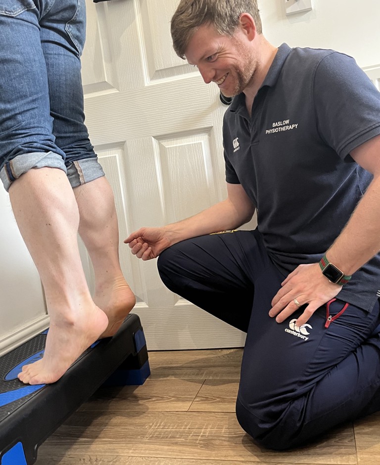 Guy Titman from Baslow Physiotherapy working with a patient, baslow physiotherapy services