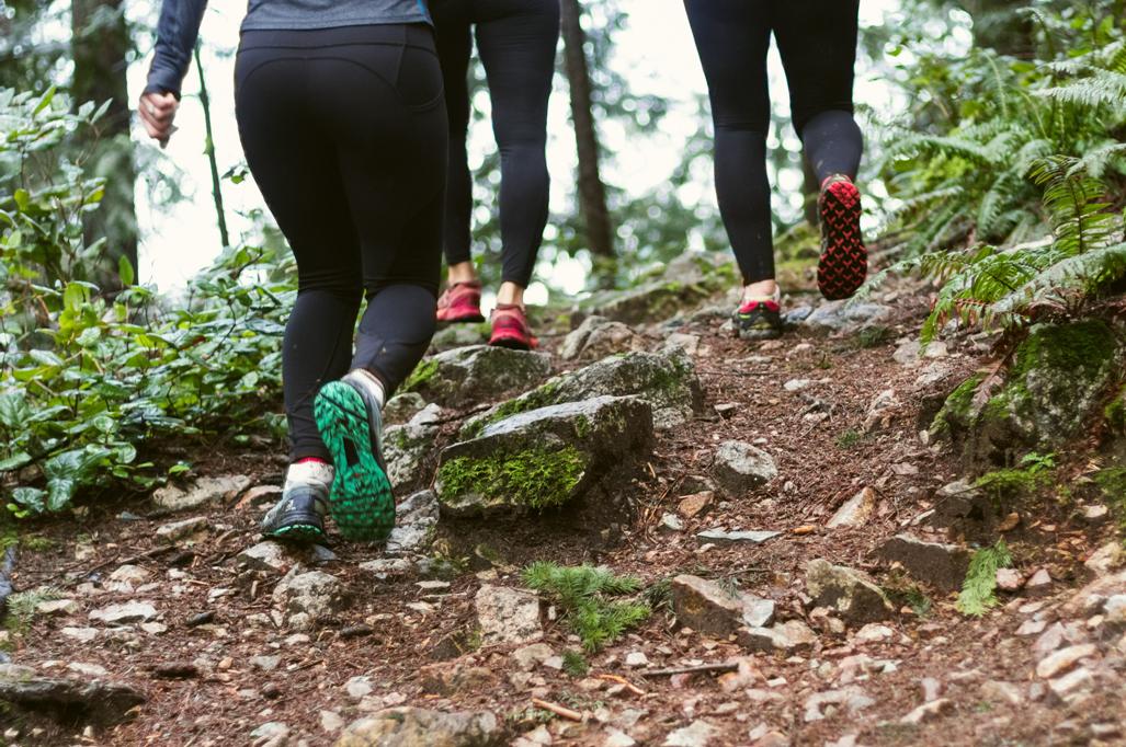 Women walking up a path in woodland, pelvic floor physical therapy, pelvic floor physical therapy