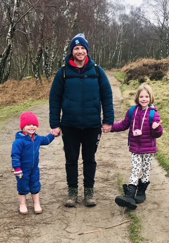 Guy Titman of Baslow Physiotherapy walking with the family in the Peak District